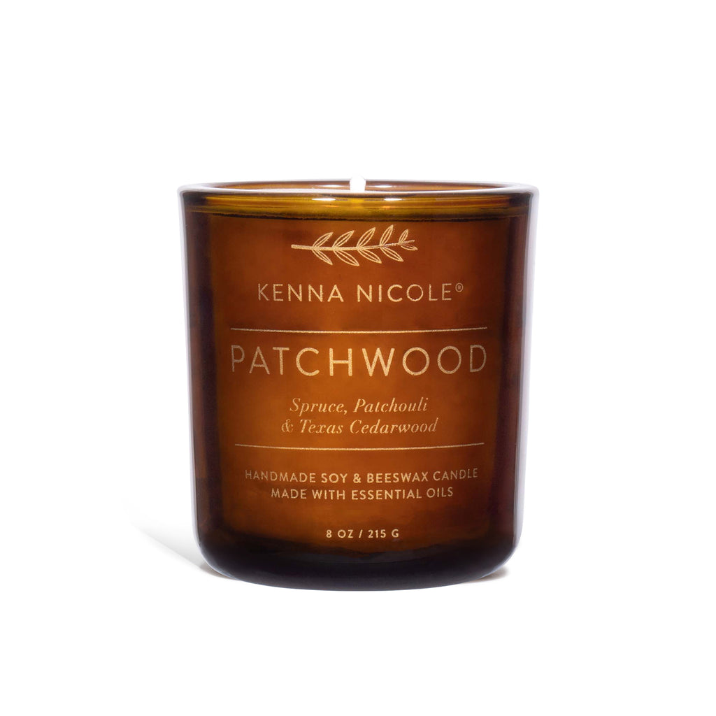 Kenna Nicole Patchwood candle on a white background